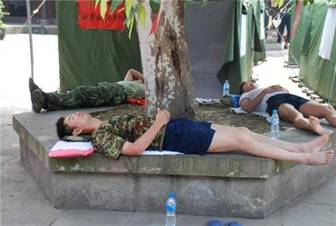 Tired workers take a well earned rest