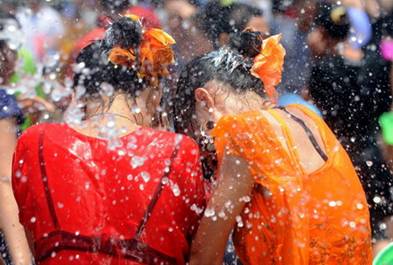 Dai girls wet during festival Xishuangbanna
