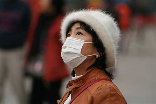 Chinese woman in face mask