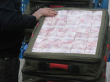 Truck Flips Over in Guangxi Spilling 600 Million Yuan in Cash 