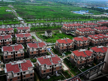True Defiance: A Glimpse into the Lives of Suzhou's "Nail House" Owners