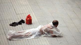 Man Creates his Own DIY Sauna on Streets of Jilin