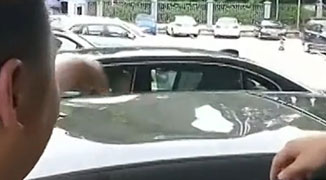 How Not to Act in China: Peeing on the Roof of a Random Car While Drunk