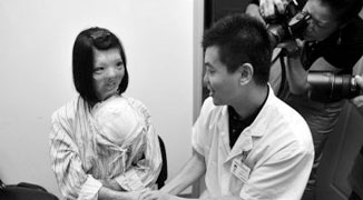 Fujian Girl to Exchange Face with One Growing on Her Shoulder