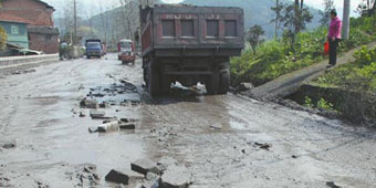 Man Arrested for Complaining About Potholes Online