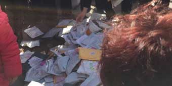 Man in Hebei Province Seen Selling China Post Parcels on Street