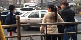 Hero Beijing Student Blocks Car from Bike Lane in Viral Video 